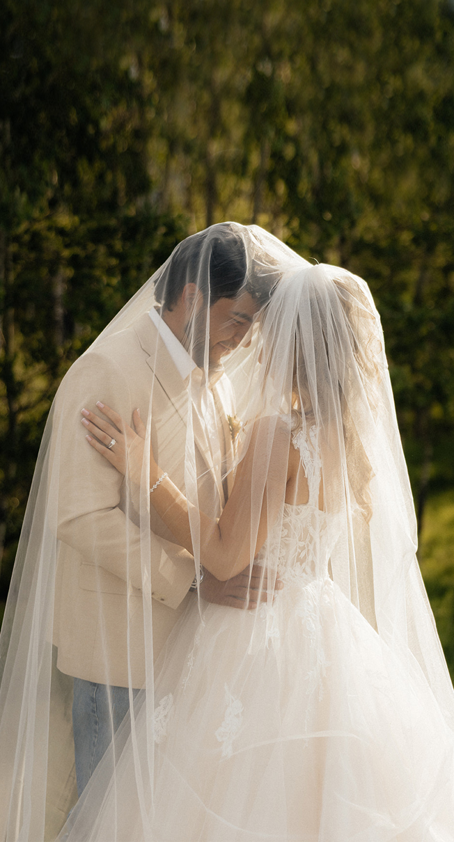 Smiling bride and groom